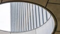 Panorama frame Close up of circular skylight with view of the concrete building exterior wall Royalty Free Stock Photo