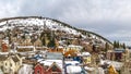 Panorama frame Colorful mountain homes in Park City Utah with cloudy sky background in winter Royalty Free Stock Photo