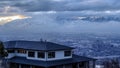 Panorama frame Downtown Salt Lake City with snowy mountain and gloomy cloudy sky view in winter Royalty Free Stock Photo