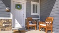 Panorama frame Facacde of a home with furniture on the welcoming sunlit porch