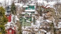 Panorama frame Lovely multi storey houses in Park City Utah on a mountain with snow in winter Royalty Free Stock Photo