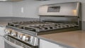 Panorama frame Range with cooktop and oven inside the modern kitchen of a new house Royalty Free Stock Photo