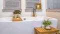 Panorama frame Relaxing bathroom interior with spotless white bathtub mirror and two windows