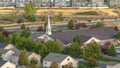 Panorama frame Rooftop view of a church and housing estate