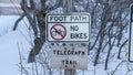 Panorama frame Signages by a foot path trail at Wasatch Mountains blanketed with snow in winter