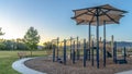 Panorama frame Slides and climbing structures at a childrens playground against sky at sunset