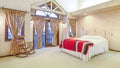 Panorama frame Spacious bedroom with beamed wooden ceiling