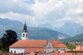 Panorama of a franciscan monastery, franciskanski samostan kamnik, with its iconic clock tower. it is a baroque monastery Royalty Free Stock Photo