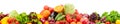 Panorama of fresh fruits and vegetables useful for health isolated on white background. Royalty Free Stock Photo