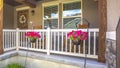 Panorama Garden stairs porch and arched entryway at the facade of a home on a sunny day Royalty Free Stock Photo