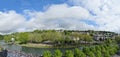 Panorama of Gave de Pau, with monastery of Discalced Carmelite nuns overlooking St. Bernadette Church, Sanctuary Lourdes, France