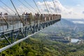 Panorama glass bridge. Rainforest cultural tourism zone Yanoda, Hainan island, Yalong Bay Tropical Paradise Forest Park next to Royalty Free Stock Photo