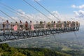 Panorama glass bridge. Rainforest cultural tourism zone Yanoda, Hainan island, Yalong Bay Tropical Paradise Forest Park next to Royalty Free Stock Photo