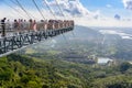 Panorama glass bridge. Rainforest cultural tourism zone Yanoda, Hainan island, Yalong Bay Tropical Paradise Forest Park next to Royalty Free Stock Photo