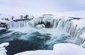 Panorama of Godafoss Waterfall, Iceland partially frozen in winter Royalty Free Stock Photo
