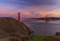 Panorama of the Golden Gate bridge with the Marin Headlands and San Francisco skyline at colorful sunset, California Royalty Free Stock Photo