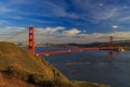 Panorama of the Golden Gate bridge with the Marin Headlands and San Francisco skyline at colorful sunset, California Royalty Free Stock Photo