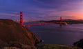 Panorama of the Golden Gate bridge with the Marin Headlands and San Francisco skyline at colorful sunset, California Royalty Free Stock Photo