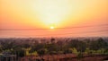 Panorama of Golden hour orange sky with clouds and the yellow sun shining nature background sunrise or sunset scene Royalty Free Stock Photo