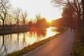 Panorama of a gorgeous scenic sunset at a river or canal