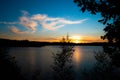 Panorama of a gorgeous sunset at a forest lake Royalty Free Stock Photo