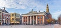 Panorama of the grain exchange building and church tower at the fish market square in Groningen