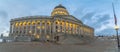 Panorama of the grand Utah State Capital Building illuminated with warm lights