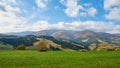 Panorama of green hills and trees in Carpathian mountains in the summer or autumn. Mountains landscape background Royalty Free Stock Photo