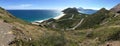 Panorama of narrow land with winding road surrounded by Caribbean sea in St Kitts and Nevis