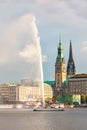 Panorama Hamburg city center with the Town Hall and a fountain.