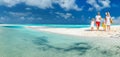 Family on a tropical beach vacation