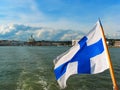 Panorama of Helsinki with Finnish flag Royalty Free Stock Photo