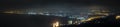 Panorama of Heraklion at night. Sea with night lights of city.