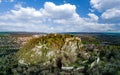Panorama of a hill with the ruins of the Hohentwil castle on its top against a blue sky Royalty Free Stock Photo