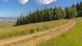 Panorama Hiking trails and lush green trees against blue sky in Park City at off season Royalty Free Stock Photo