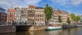 Panorama of histrorical houses at a canal in Amsterdam Royalty Free Stock Photo