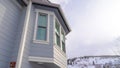 Panorama Home exterior in Park City Utah with bay window and gray horizontal wall siding Royalty Free Stock Photo