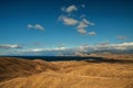 panorama, horizontal view of Crimean mountains with rocky coastline in the foreground , blue sky and Black sea Royalty Free Stock Photo