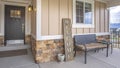 Panorama House exterior with porch and glass paned wooden front door