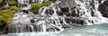 Panorama of Hraunfossar waterfall cascade in Iceland Royalty Free Stock Photo
