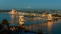 Hungarian Parliament, and the Chain bridge Szechenyi Lanchid, over the River Danube, Budapest, Hungary, at night Royalty Free Stock Photo