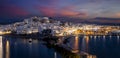 Panorama of the illuminated city and marina of Naxos island