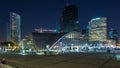 Panorama of illuminated skyscrapers timelapse in famous financial and business district of Paris - La Defense. Royalty Free Stock Photo