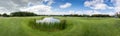 Panorama image of golf club with pond and perfect green grass Royalty Free Stock Photo