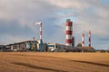 Panorama of industrial landscape environmental pollution waste of thermal power plant. Big pipes of chemical industry enterprise Royalty Free Stock Photo