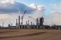 Panorama of industrial landscape environmental pollution waste of thermal power plant. Big pipes of chemical industry enterprise Royalty Free Stock Photo