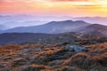 Panorama with interesting sunrise enlightens surroundings. Landscape with beautiful mountains and stones. Fantastic autumn scenery Royalty Free Stock Photo