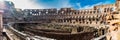 Panorama of the interior of the Roman Colosseum showing the arena and the hypogeum in a beautiful sunny