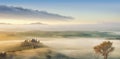 Idyllic view, foggy Tuscan hills in light of the rising sun Royalty Free Stock Photo