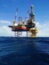 Jack up rig with oil platform at sea with blue sky